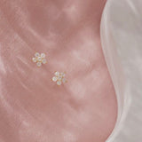 Adorn 512 Gold Plated & CZ Tiny Flower Stud Earrings